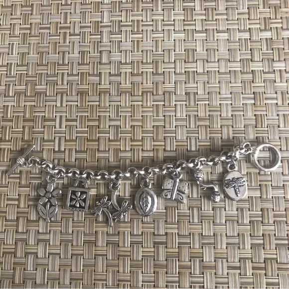 Cute Little Charm Bracelet with 7 charms including flowers , ladybug, butterfly - Picture 4 of 7